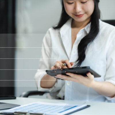 Businesswoman using tablet to do online checklist survey, doing assessment online survey answer test questions Digital form.